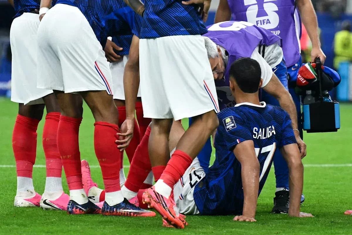 Medical staff attending to injured player on field Medical staff attending to injured player on field