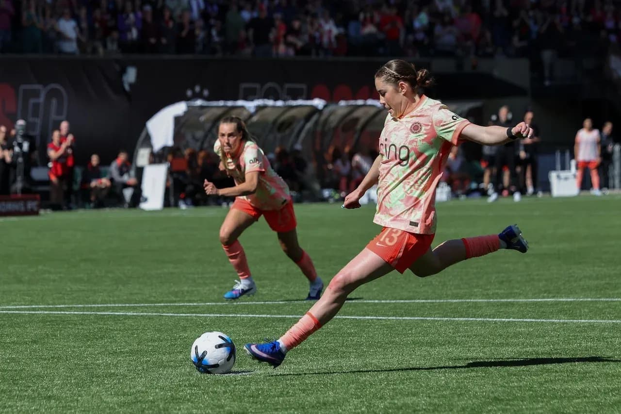 Player kicking ball during Kansas City vs Portland match Player kicking ball during Kansas City vs Portland match