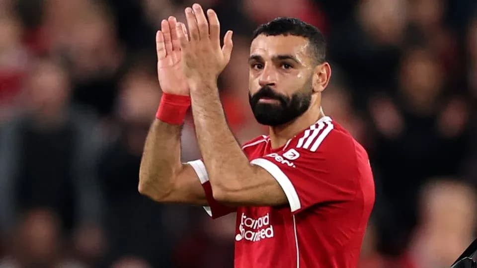 Player applauding fans in Liverpool jersey Player applauding fans in Liverpool jersey