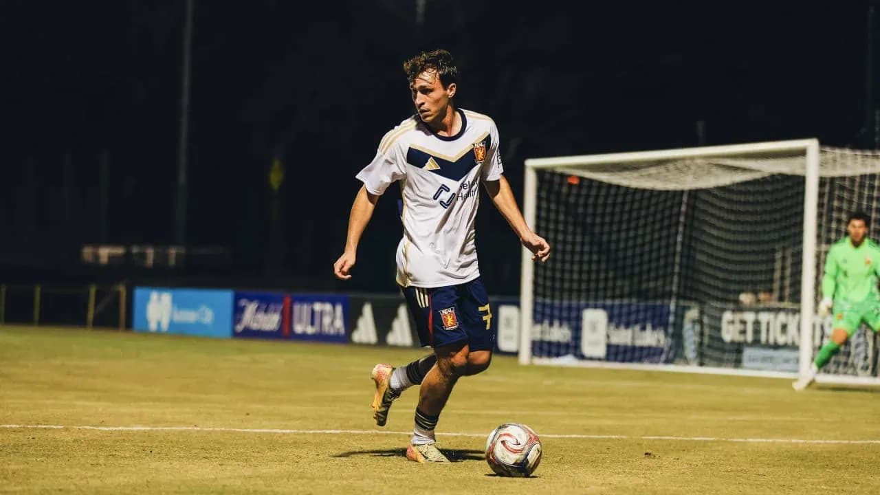 Player dribbling the ball during match Player dribbling the ball during match