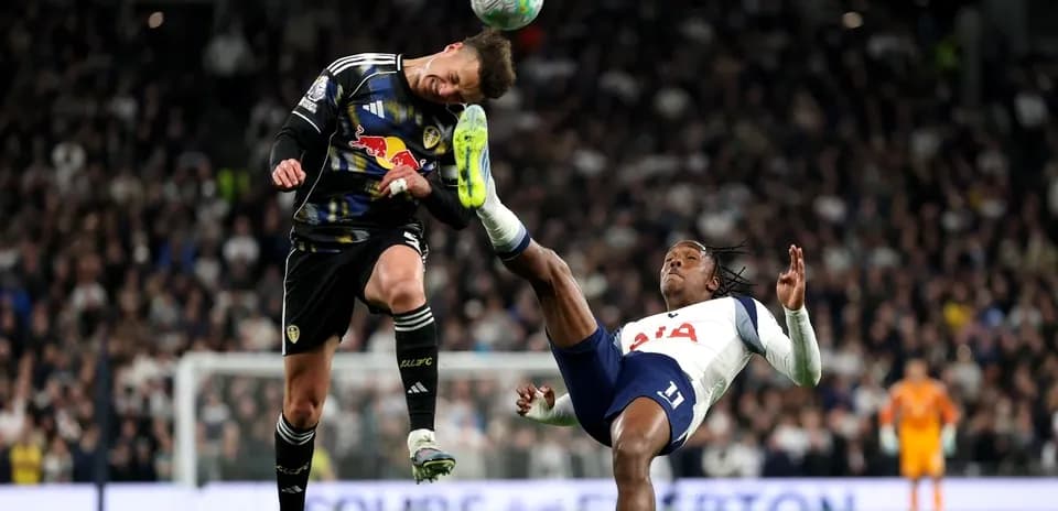 Goalkeeper and player colliding during a match Goalkeeper and player colliding during a match