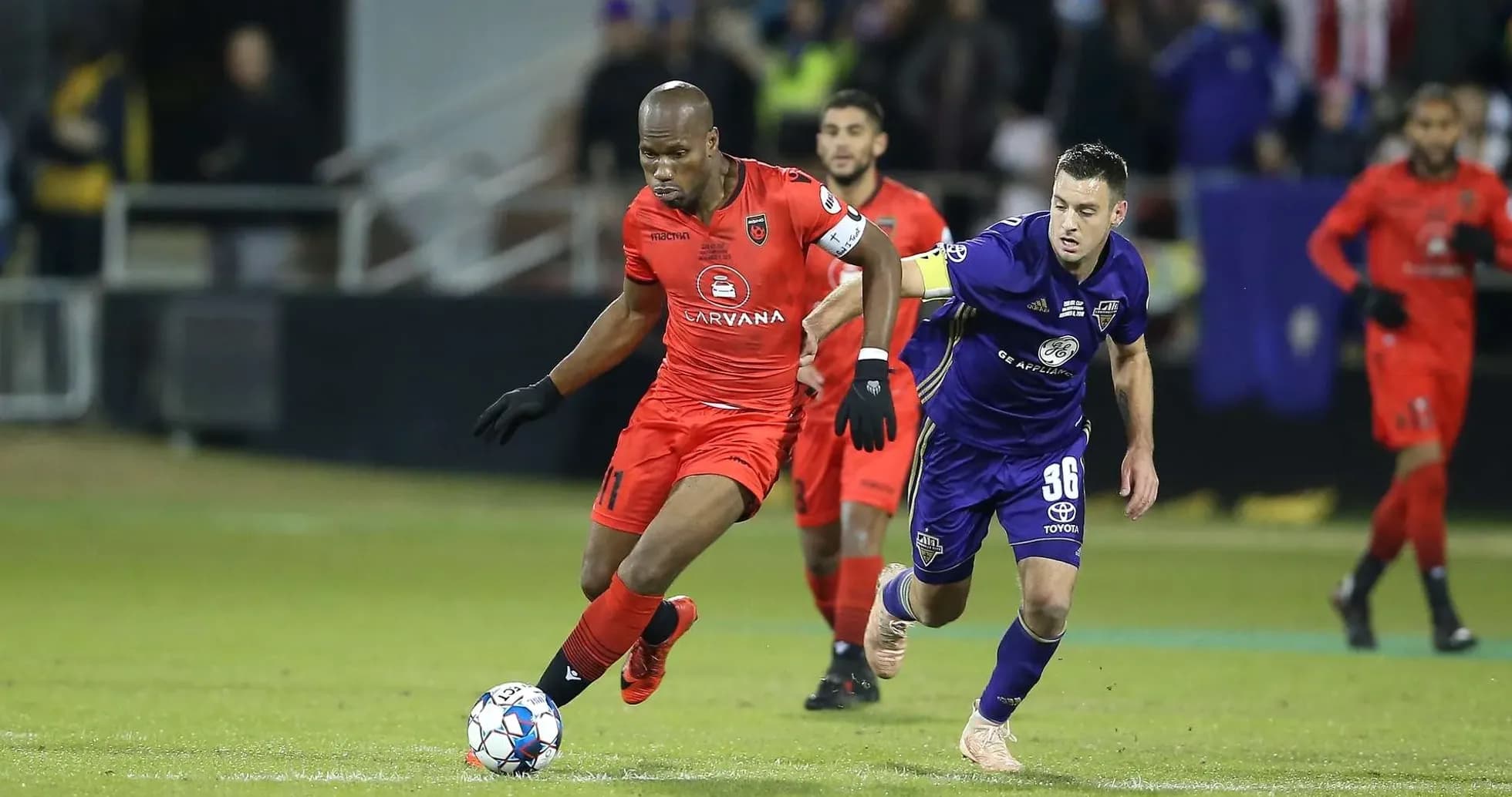 Player dribbling the ball during match Player dribbling the ball during match