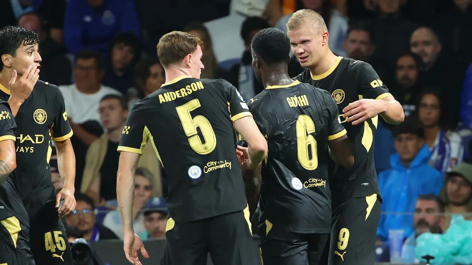 Players celebrating during a football match Players celebrating during a football match