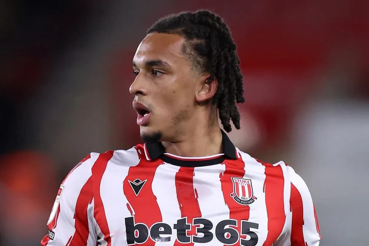 Stoke City player in red and white striped jersey Stoke City player in red and white striped jersey