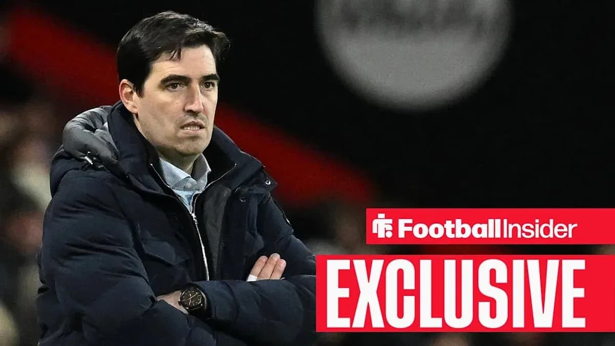 Manager observing match with arms crossed on sidelines Manager observing match with arms crossed on sidelines