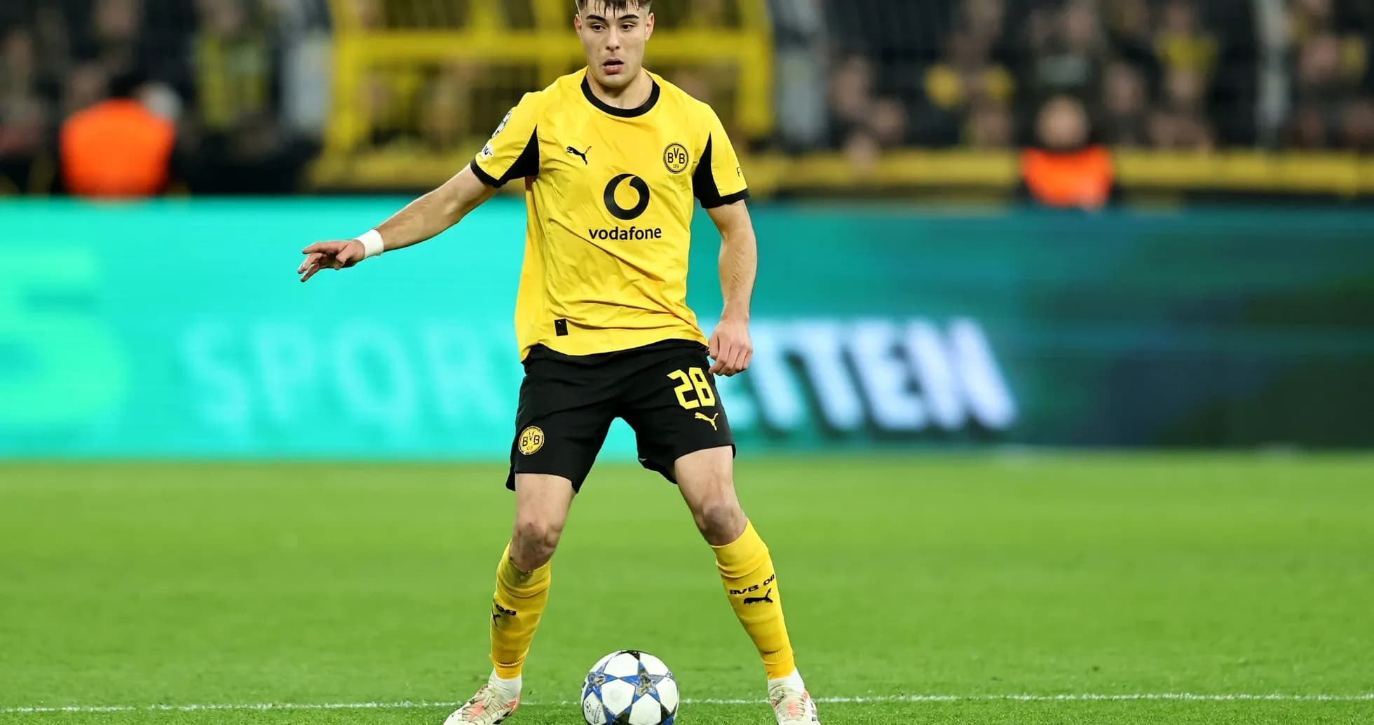 Borussia Dortmund player with ball during match Borussia Dortmund player with ball during match