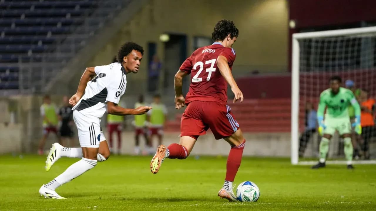 Chicago Fire II player dribbling past opponent Chicago Fire II player dribbling past opponent