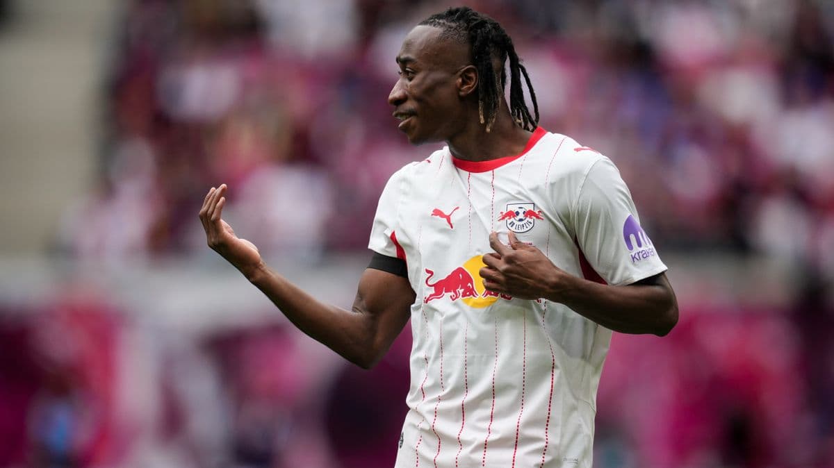 Player gesturing during match in RB Leipzig kit Player gesturing during match in RB Leipzig kit