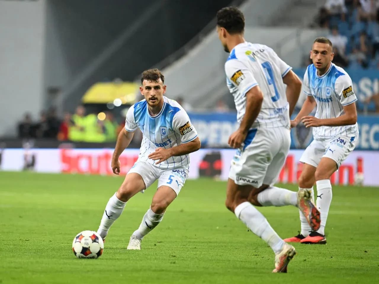 Universitatea Craiova players during a match Universitatea Craiova players during a match