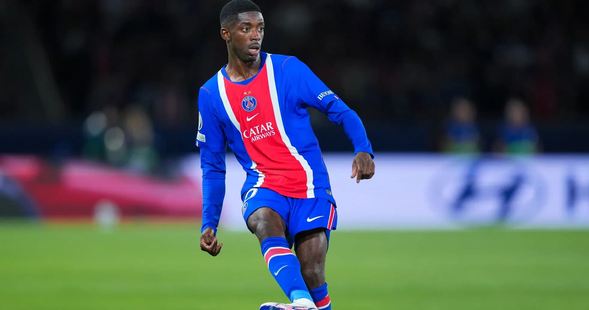 Player in Paris Saint-Germain kit on the field Player in Paris Saint-Germain kit on the field