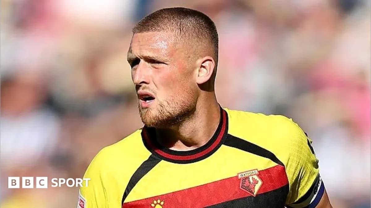 Watford player during match with focused expression Watford player during match with focused expression