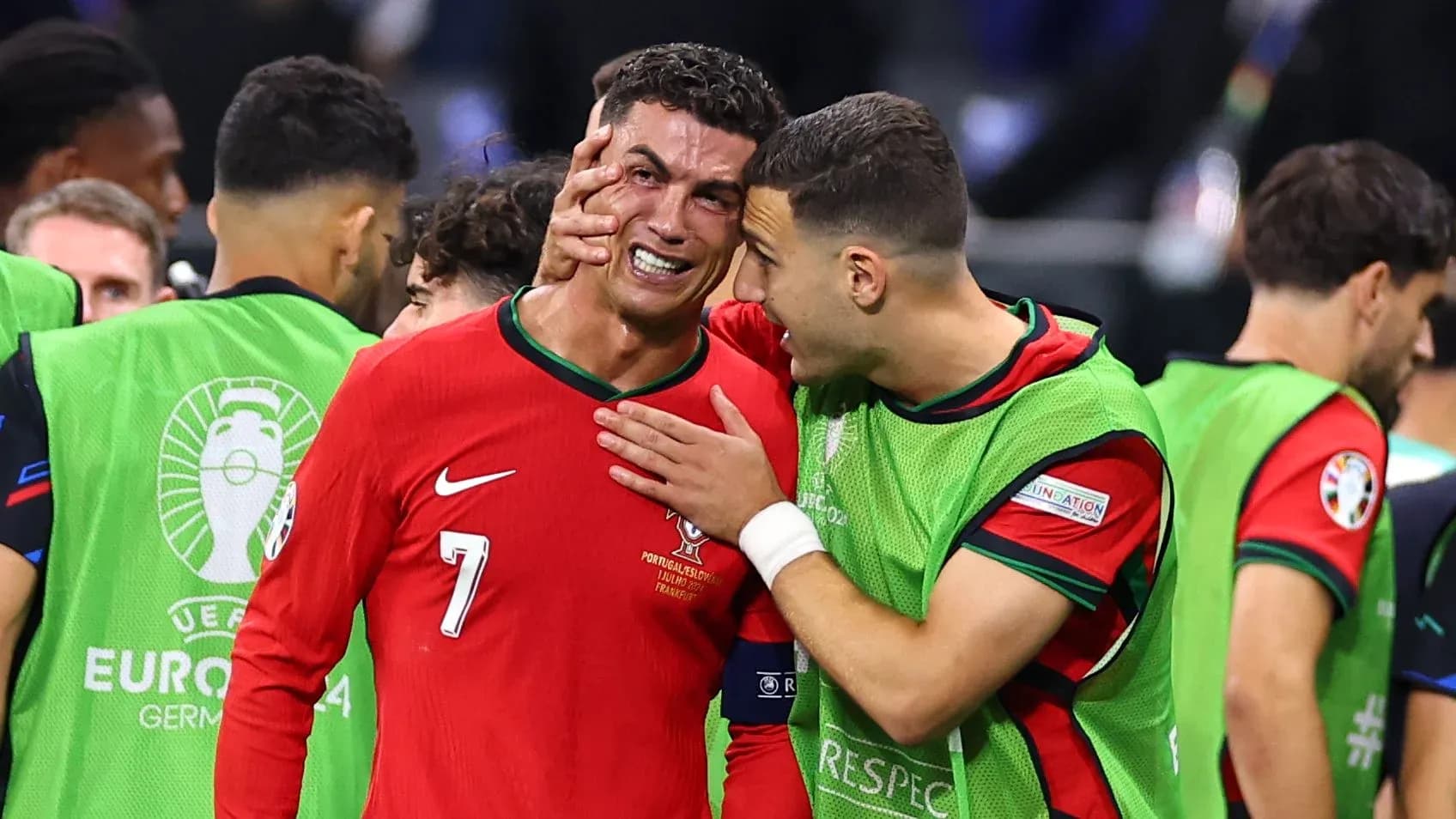 Cristiano Ronaldo and teammate celebrating on the field Cristiano Ronaldo and teammate celebrating on the field