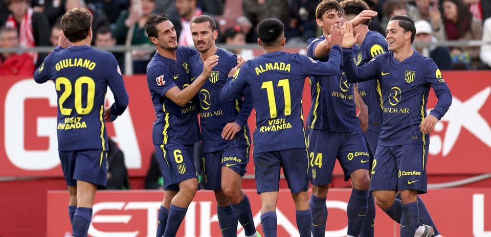 Atletico Madrid players celebrating a goal Atletico Madrid players celebrating a goal