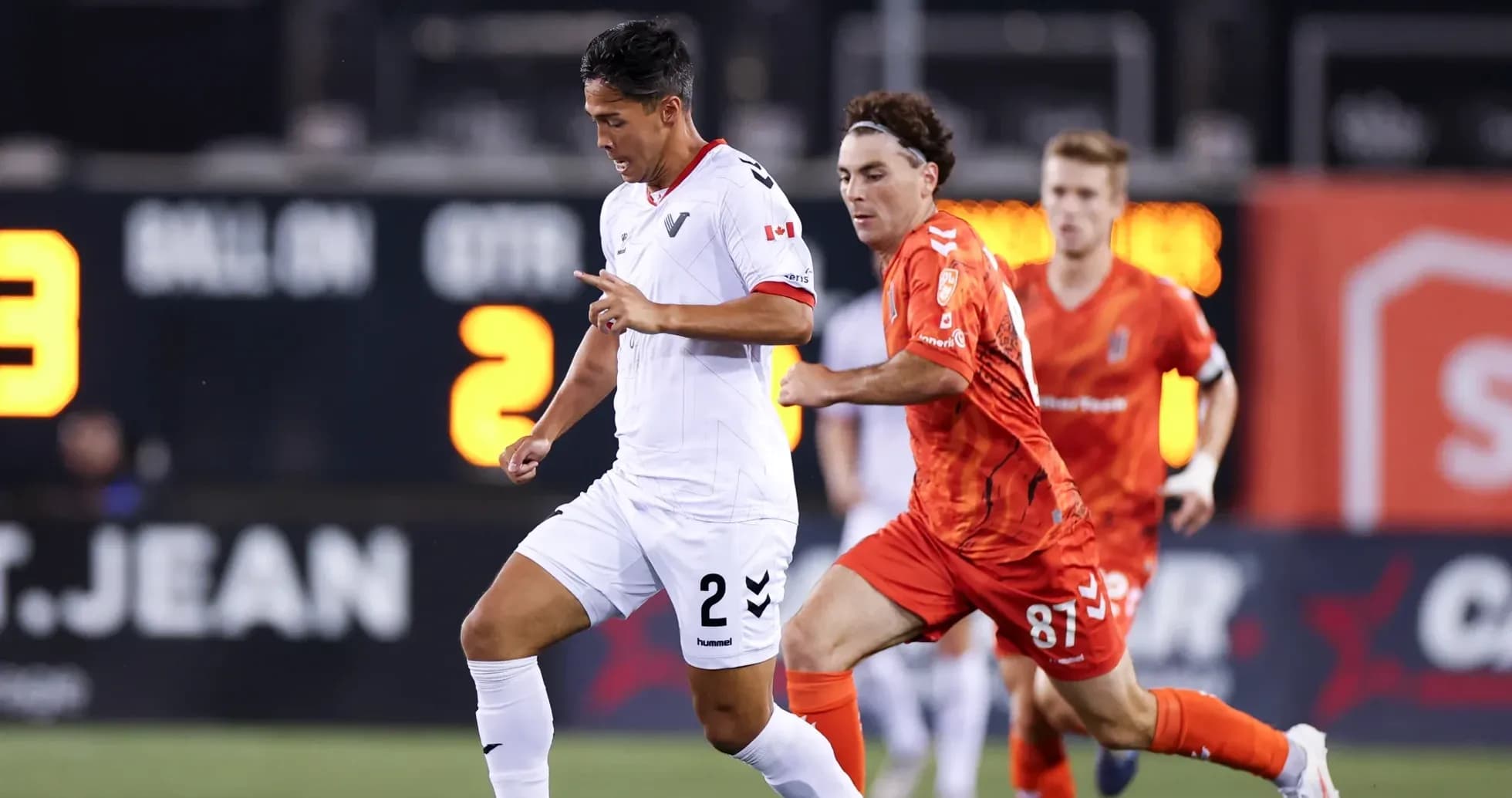 Vancouver FC player dribbling past Forge defender Vancouver FC player dribbling past Forge defender