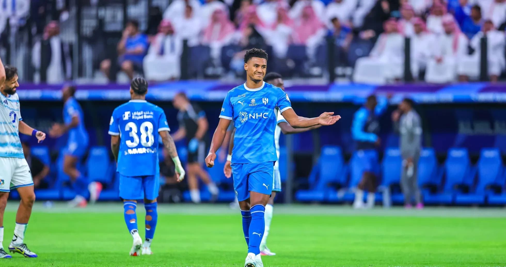 Player in blue jersey gesturing during match Player in blue jersey gesturing during match