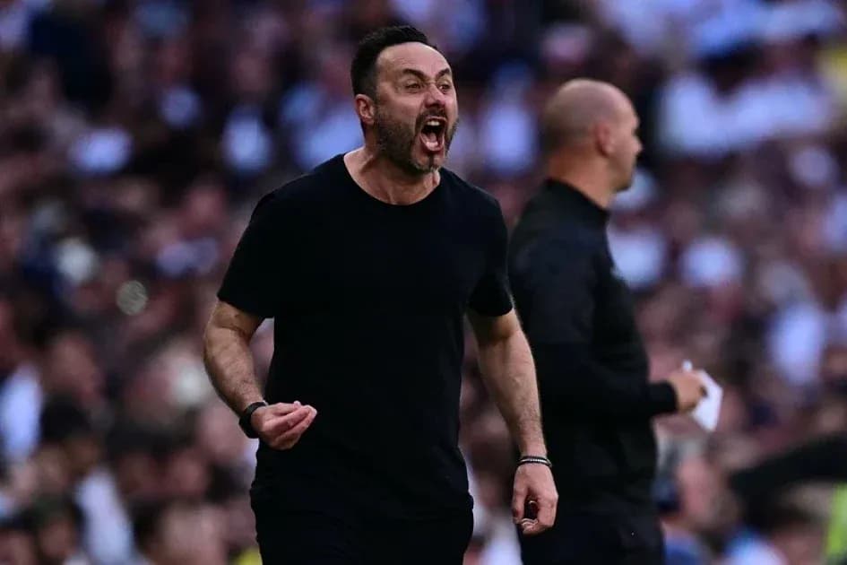 Coach celebrating passionately on the sidelines during match Coach celebrating passionately on the sidelines during match