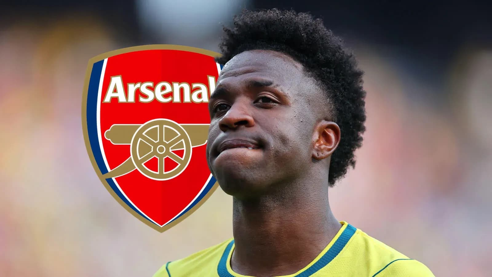 Player standing with Arsenal logo in background Player standing with Arsenal logo in background