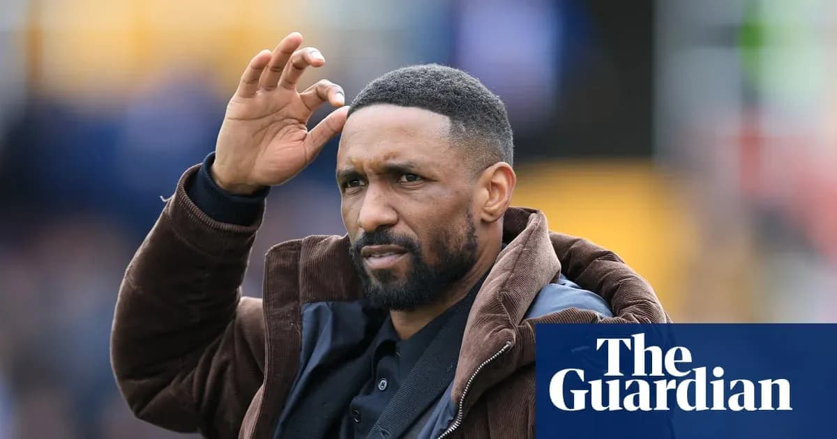 Man gesturing during a football match Man gesturing during a football match