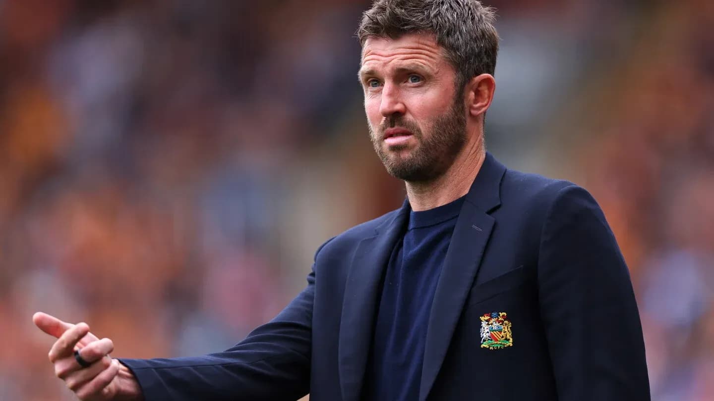 Manager gesturing during a match on the sidelines Manager gesturing during a match on the sidelines