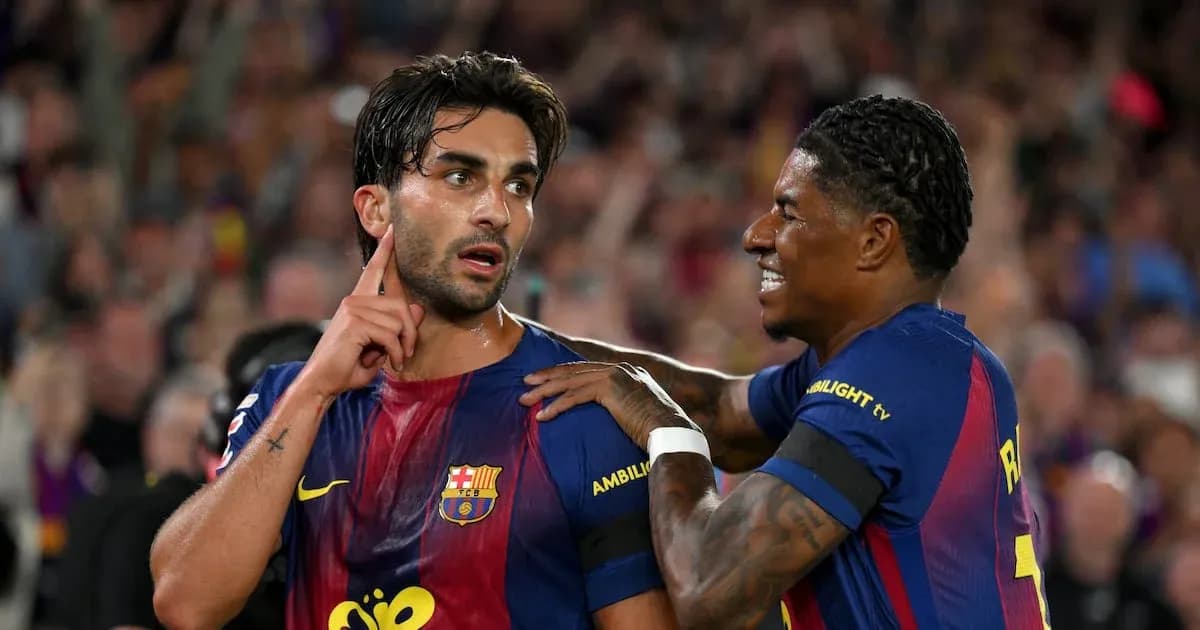 Barcelona players celebrating a goal on the pitch Barcelona players celebrating a goal on the pitch