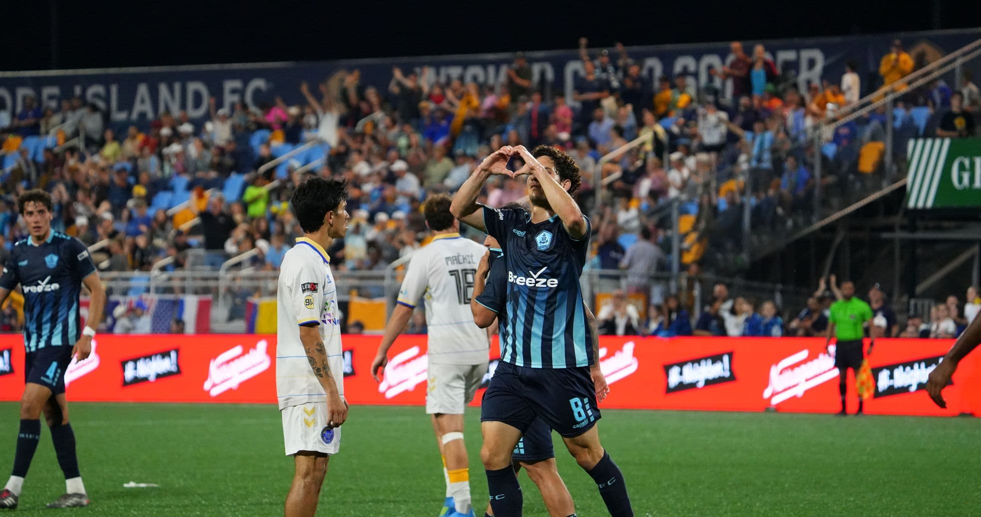 Player celebrating after scoring during match Player celebrating after scoring during match