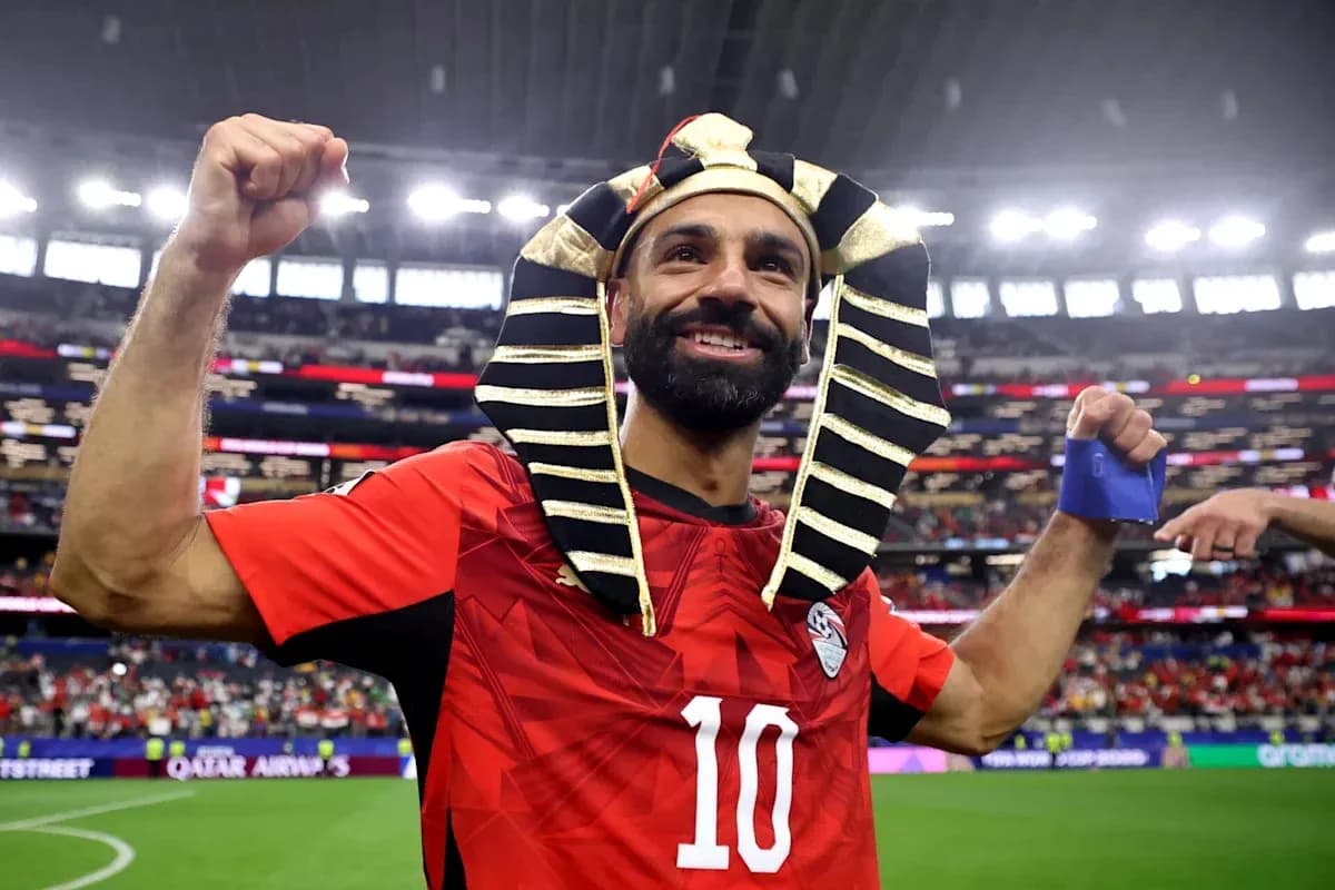 Player celebrating with pharaoh headdress after match Player celebrating with pharaoh headdress after match