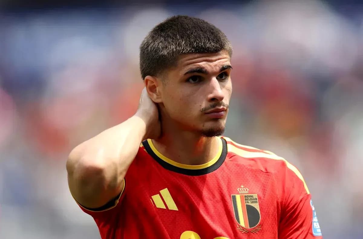 Belgian player looking thoughtful on the field Belgian player looking thoughtful on the field