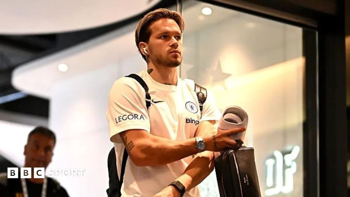 Player arriving with bag and headphones at venue Player arriving with bag and headphones at venue