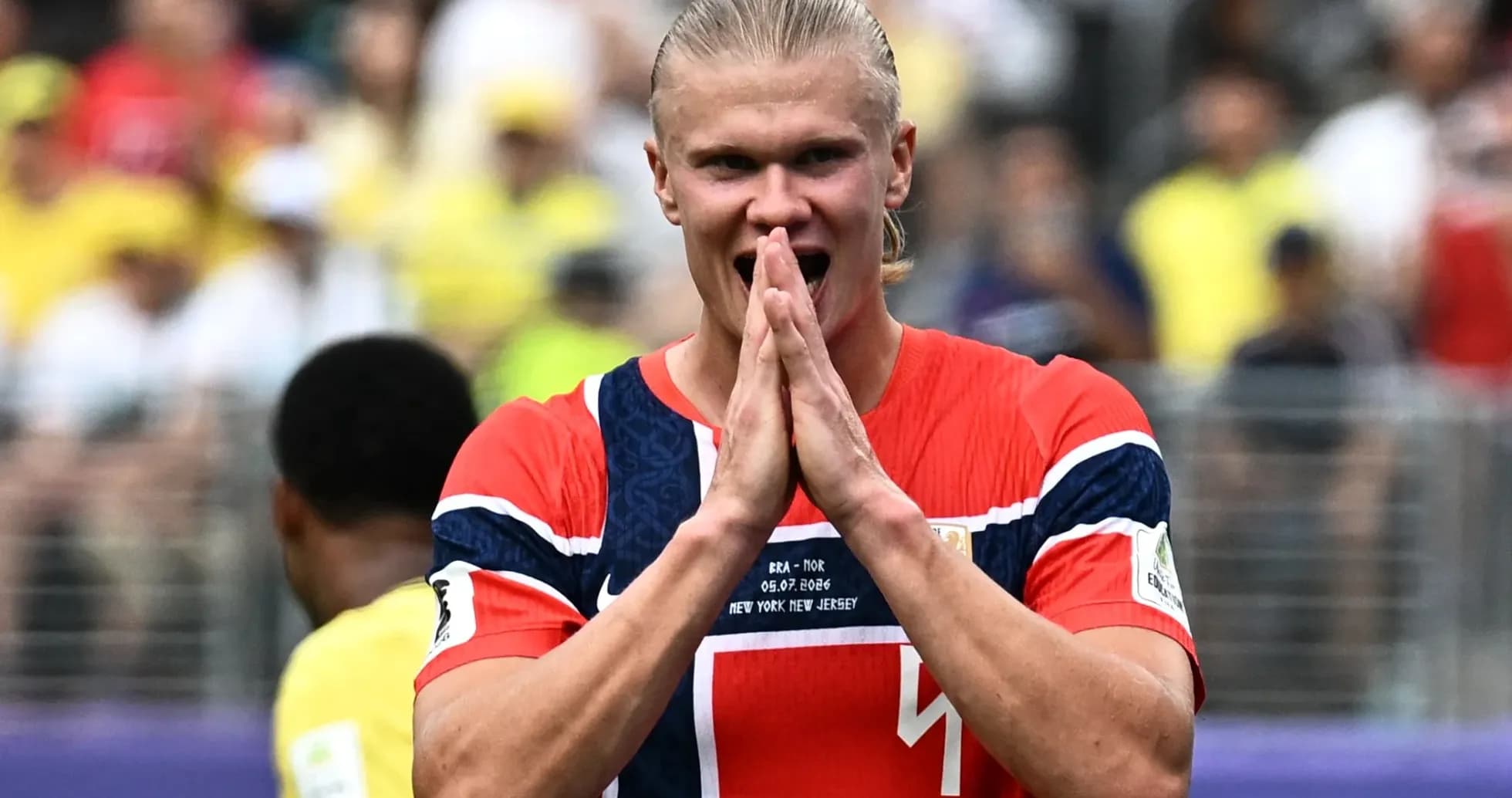 Player celebrating during match with clasped hands Player celebrating during match with clasped hands
