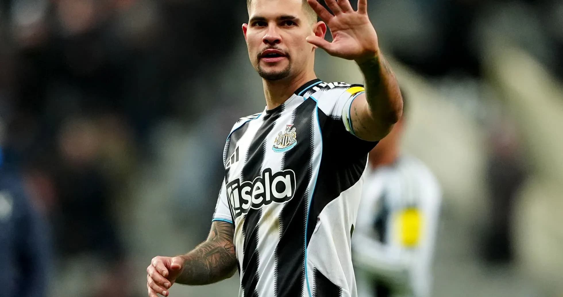 Player waving to fans during a match Player waving to fans during a match