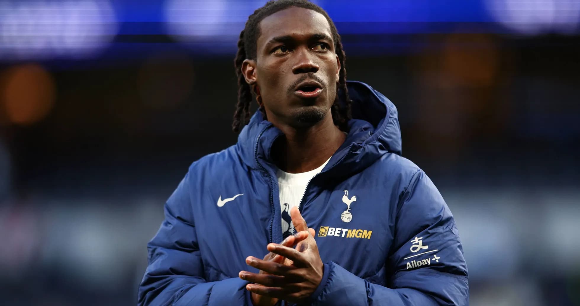 Player in Tottenham jacket preparing for match Player in Tottenham jacket preparing for match