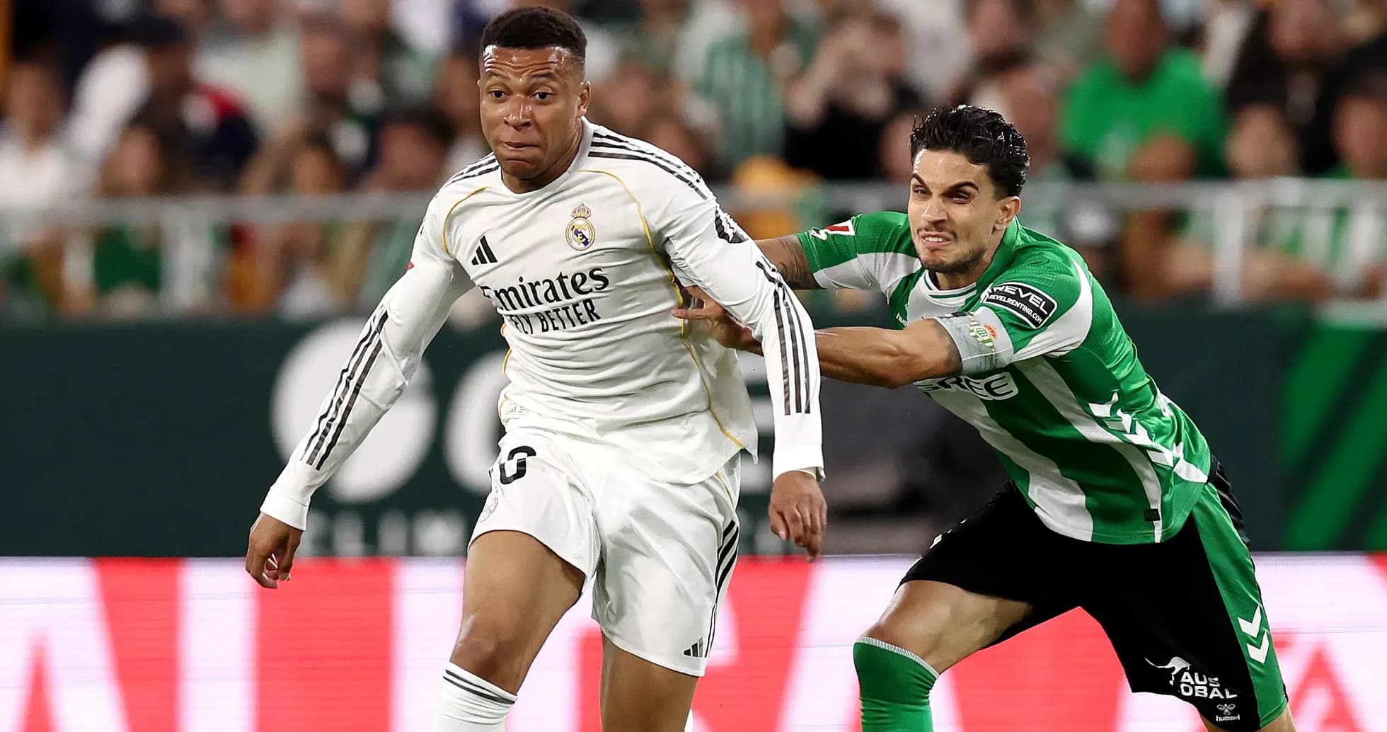 Mbappé sprinting with defender pulling his shirt Mbappé sprinting with defender pulling his shirt