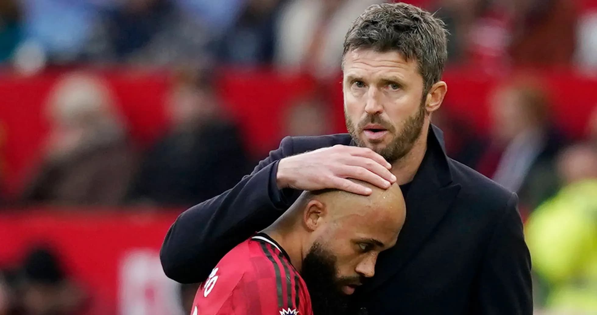 Coach comforting player on the sidelines during match Coach comforting player on the sidelines during match