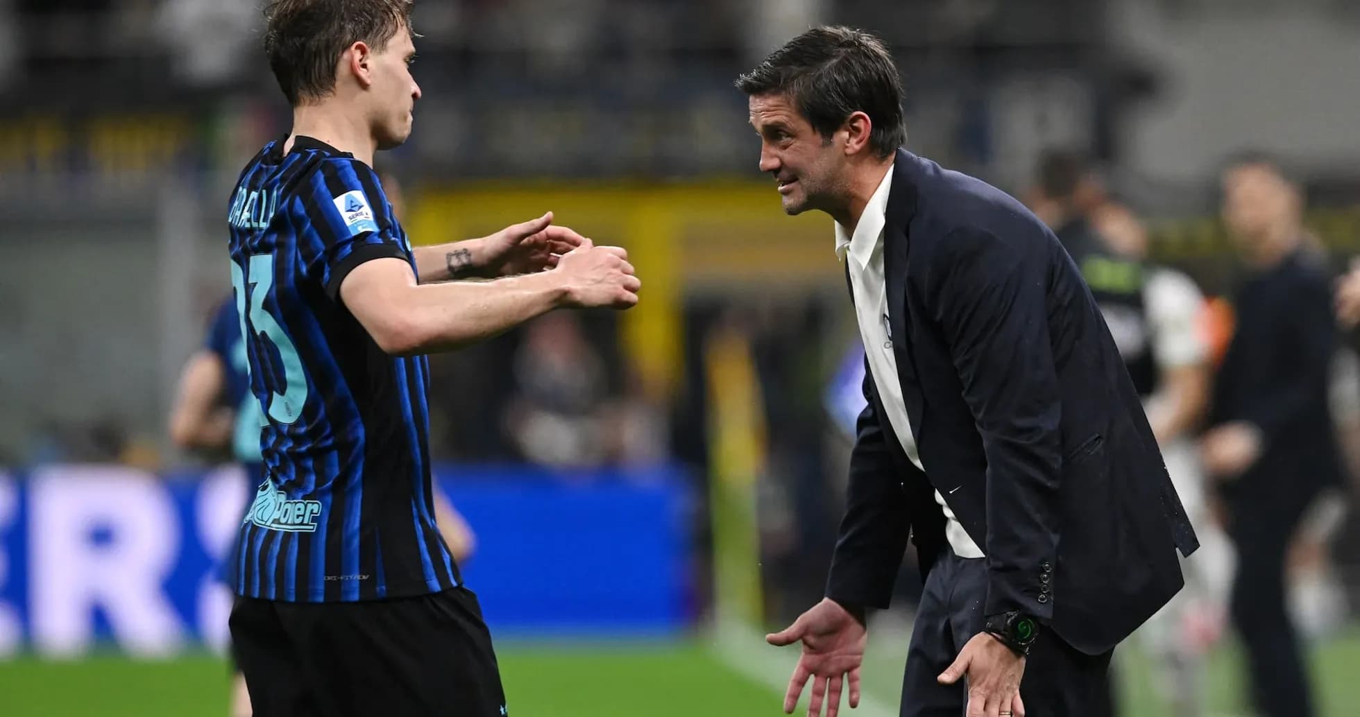 Inter player discussing strategy with coach Inter player discussing strategy with coach