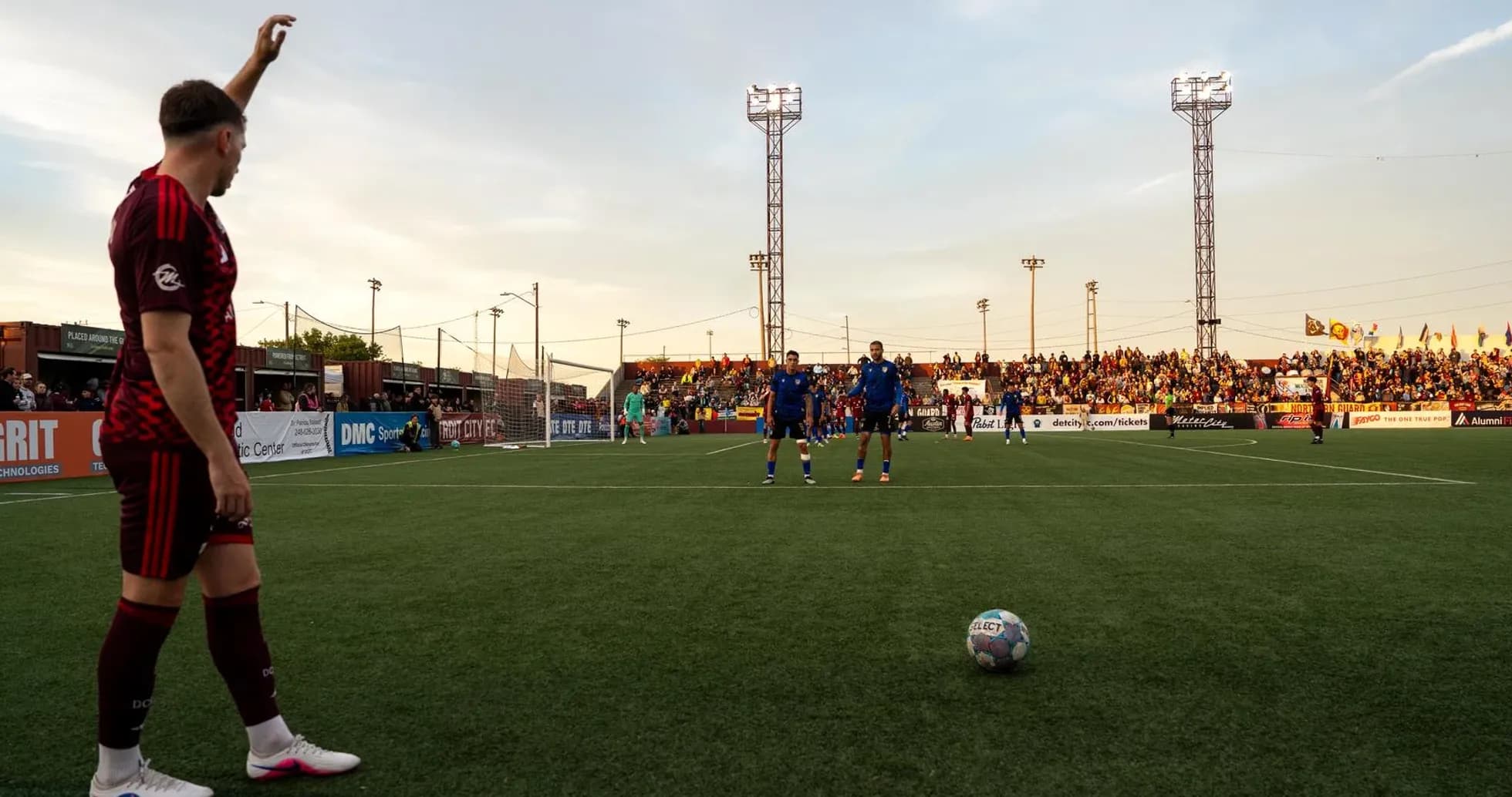 Player preparing for free kick during match Player preparing for free kick during match