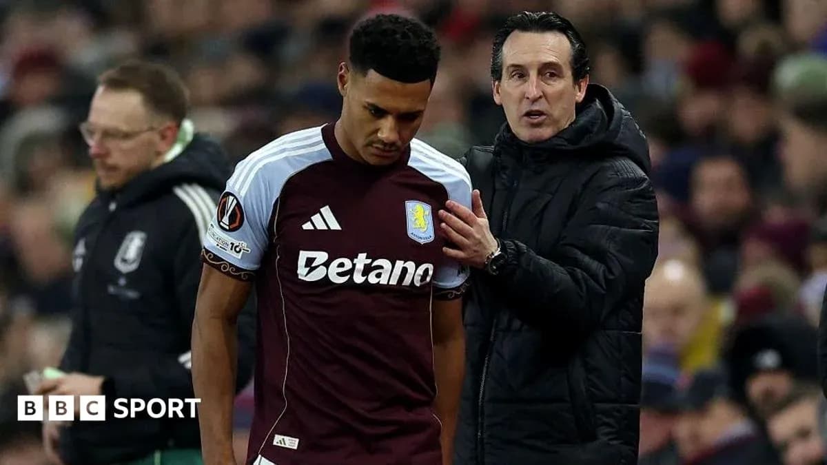 Aston Villa player being spoken to by coach Aston Villa player being spoken to by coach