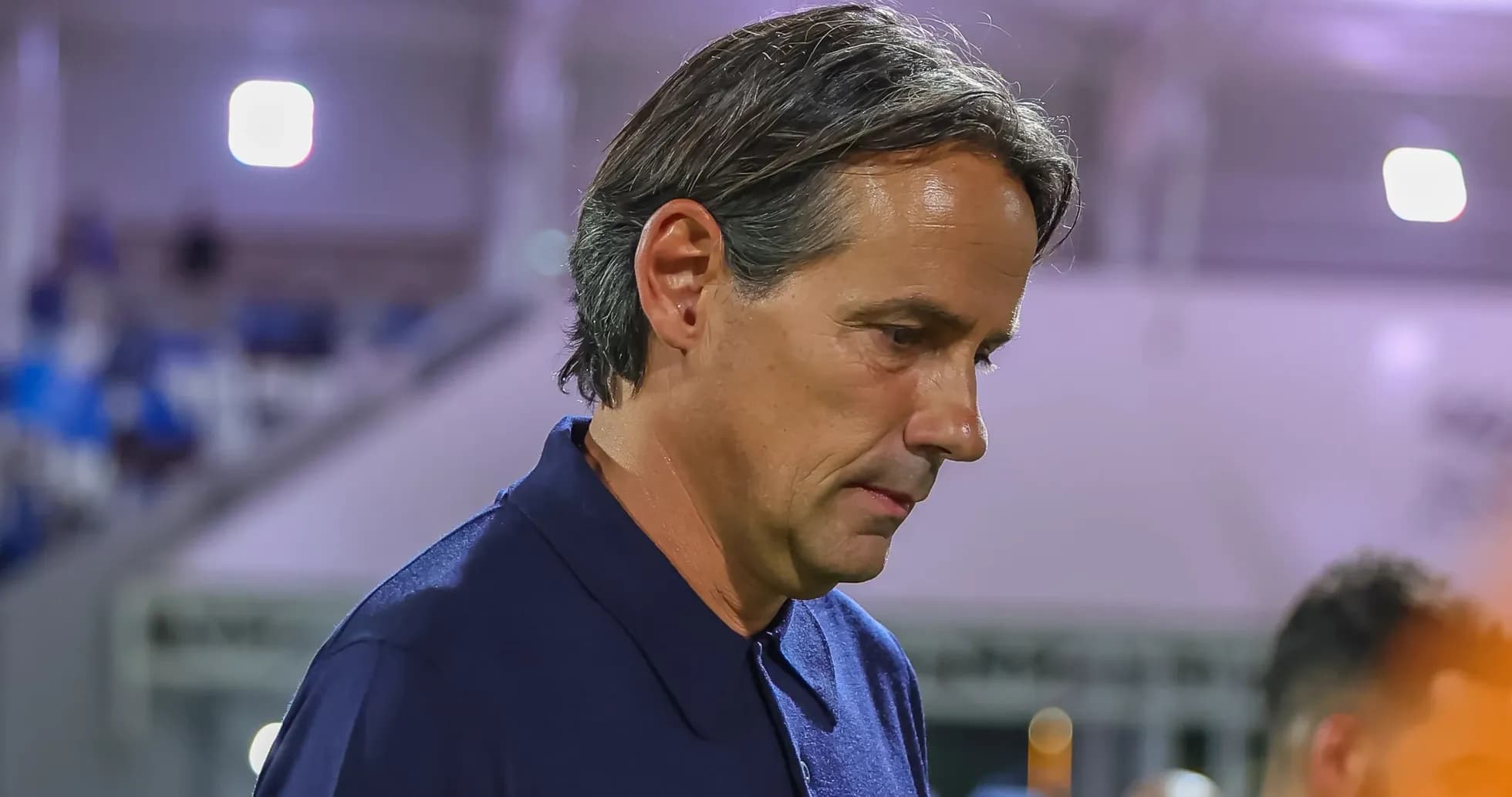 Coach walking on the sideline during match Coach walking on the sideline during match