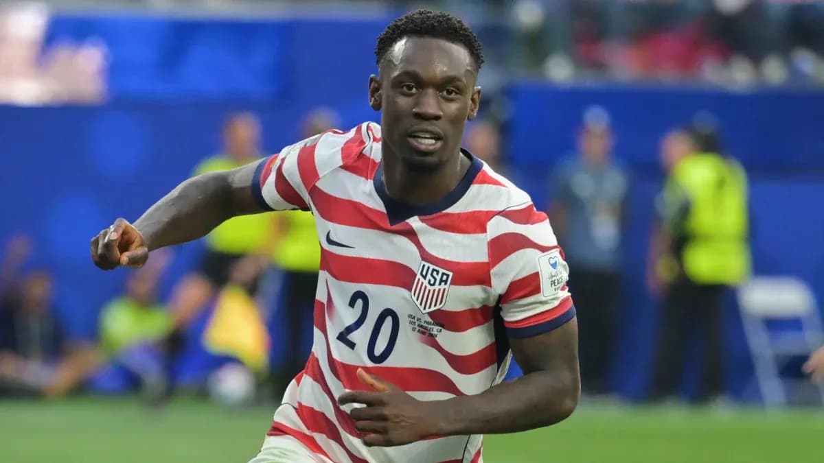 Player in USA jersey celebrating a goal Player in USA jersey celebrating a goal