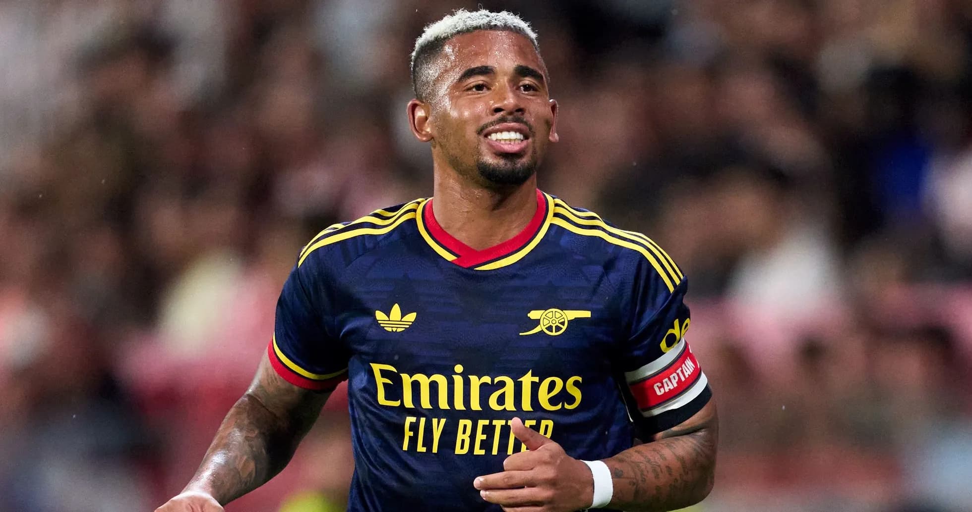 Player wearing Arsenal jersey during a match Player wearing Arsenal jersey during a match