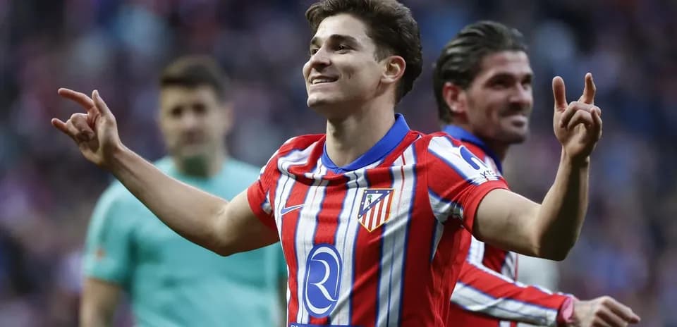Atletico Madrid player celebrating a goal Atletico Madrid player celebrating a goal