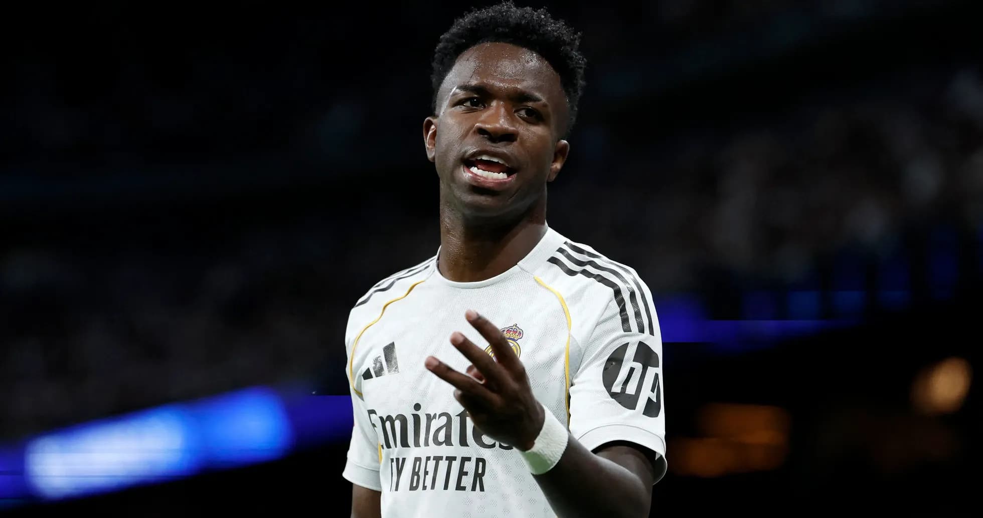 Player gesturing during match in white jersey Player gesturing during match in white jersey