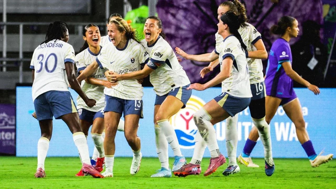 Players celebrating a goal during NWSL match Players celebrating a goal during NWSL match