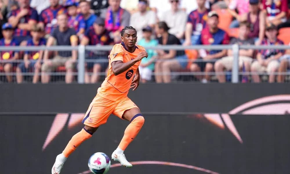 Player running during a match in orange kit Player running during a match in orange kit