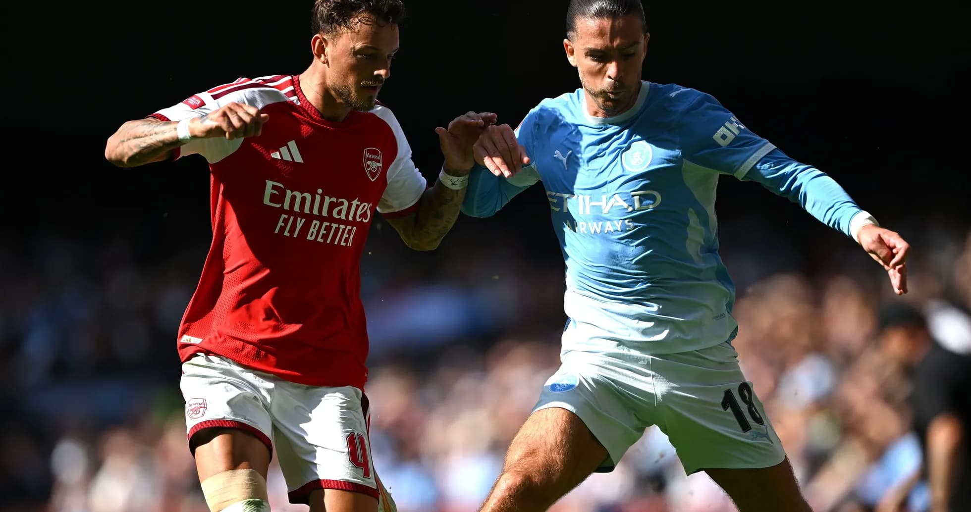 Two players battling for possession during match Two players battling for possession during match