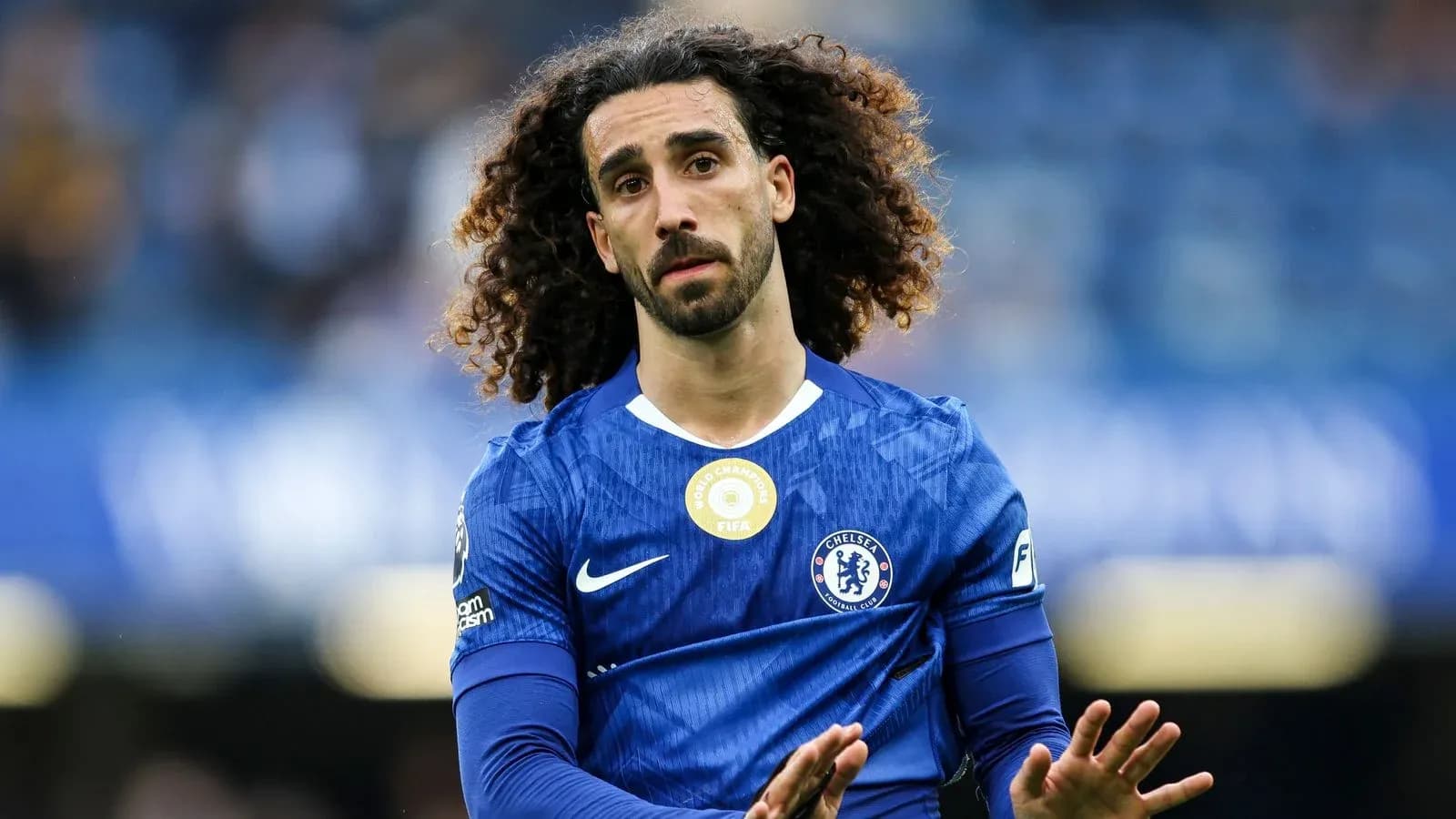 Player in blue Chelsea jersey on the pitch Player in blue Chelsea jersey on the pitch