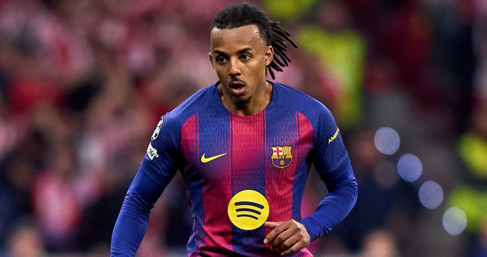 Player in Barcelona kit running on the pitch Player in Barcelona kit running on the pitch