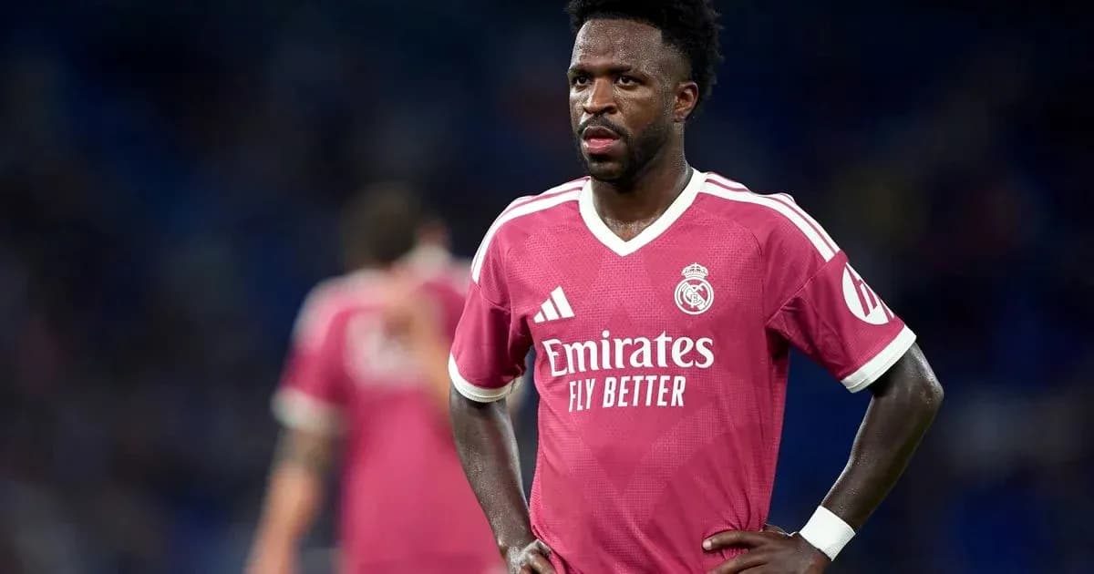 Player in pink Real Madrid kit on field Player in pink Real Madrid kit on field