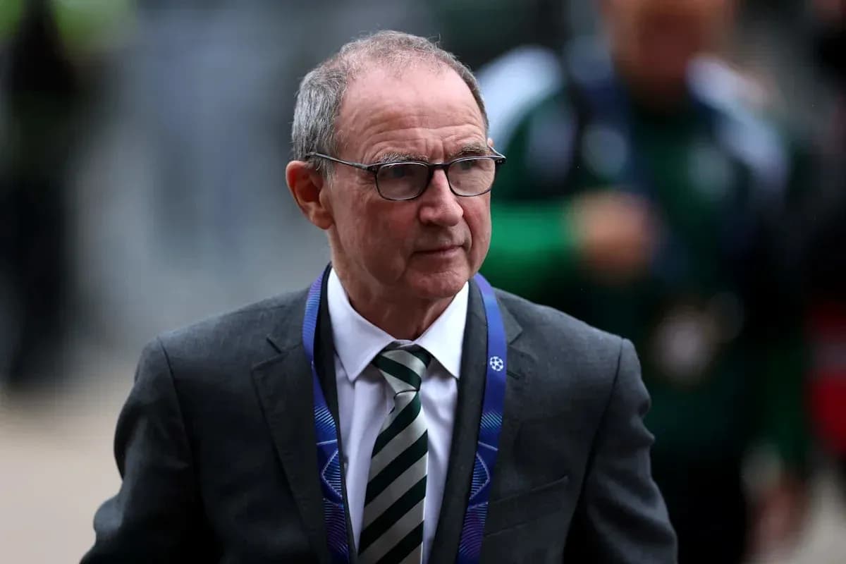 Man in suit arriving at UEFA match venue Man in suit arriving at UEFA match venue