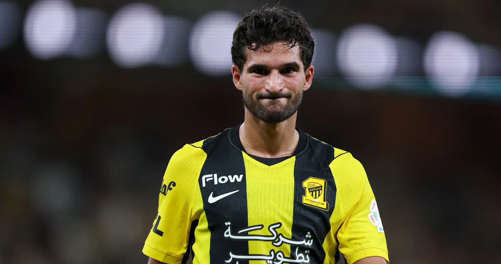 Player in yellow and black jersey after match Player in yellow and black jersey after match