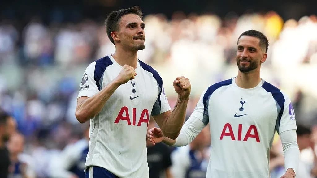Tottenham players celebrating after a match Tottenham players celebrating after a match